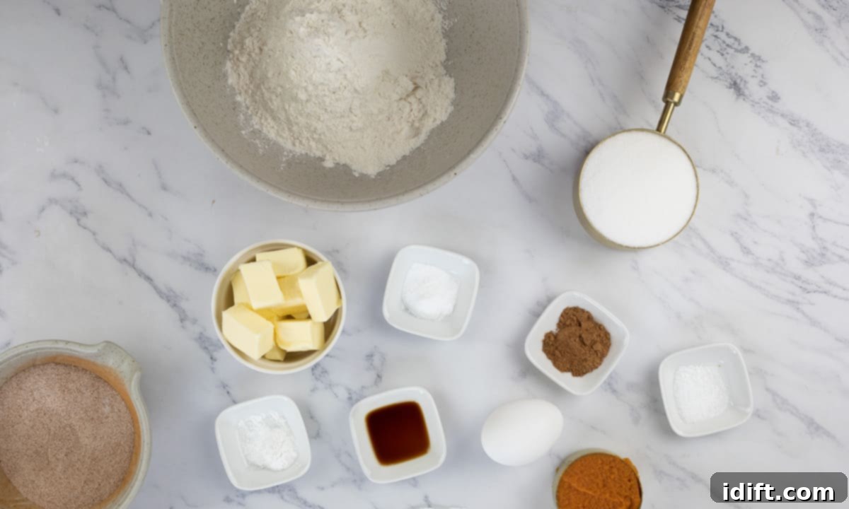 Ingredients laid out on a counter for making pumpkin snickerdoodle cookies.