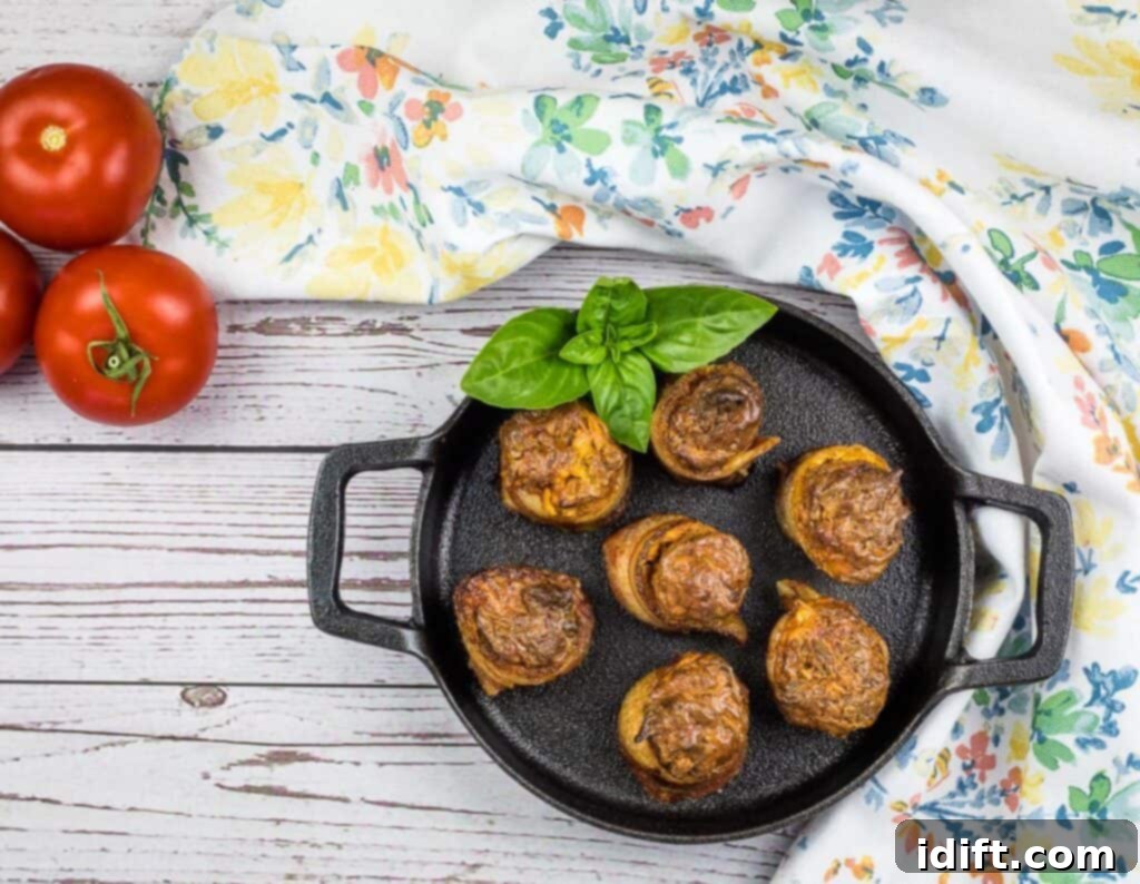 smoked pork shots arranged in a black cast iron dish, garnished for serving
