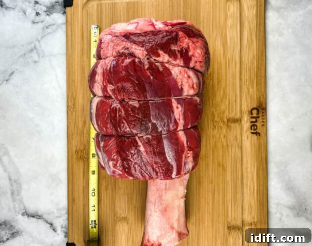 Smoked Beef Shank: The Legendary Cut 3 raw smoked thor's hammer next to a measuring tape