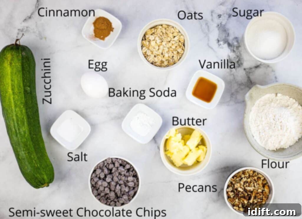 A vibrant display of fresh ingredients laid out for making zucchini cookies with chocolate and pecans.