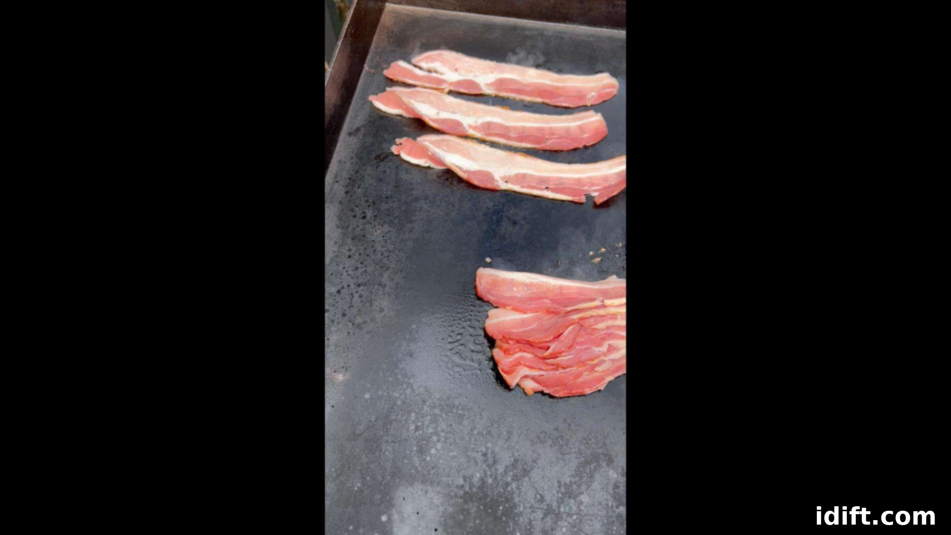 Blackstone Bacon Mastery: Achieve Crispy Perfection 8 Carefully adding individual strips of bacon to the preheated griddle, ensuring no overlap for even cooking.