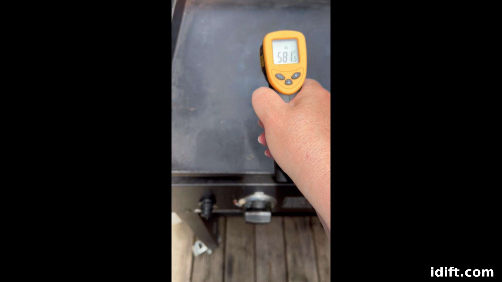 Blackstone Bacon Mastery: Achieve Crispy Perfection 7 A laser heat thermometer accurately checking the temperature of the griddle surface, ensuring it's hot enough for perfect bacon.