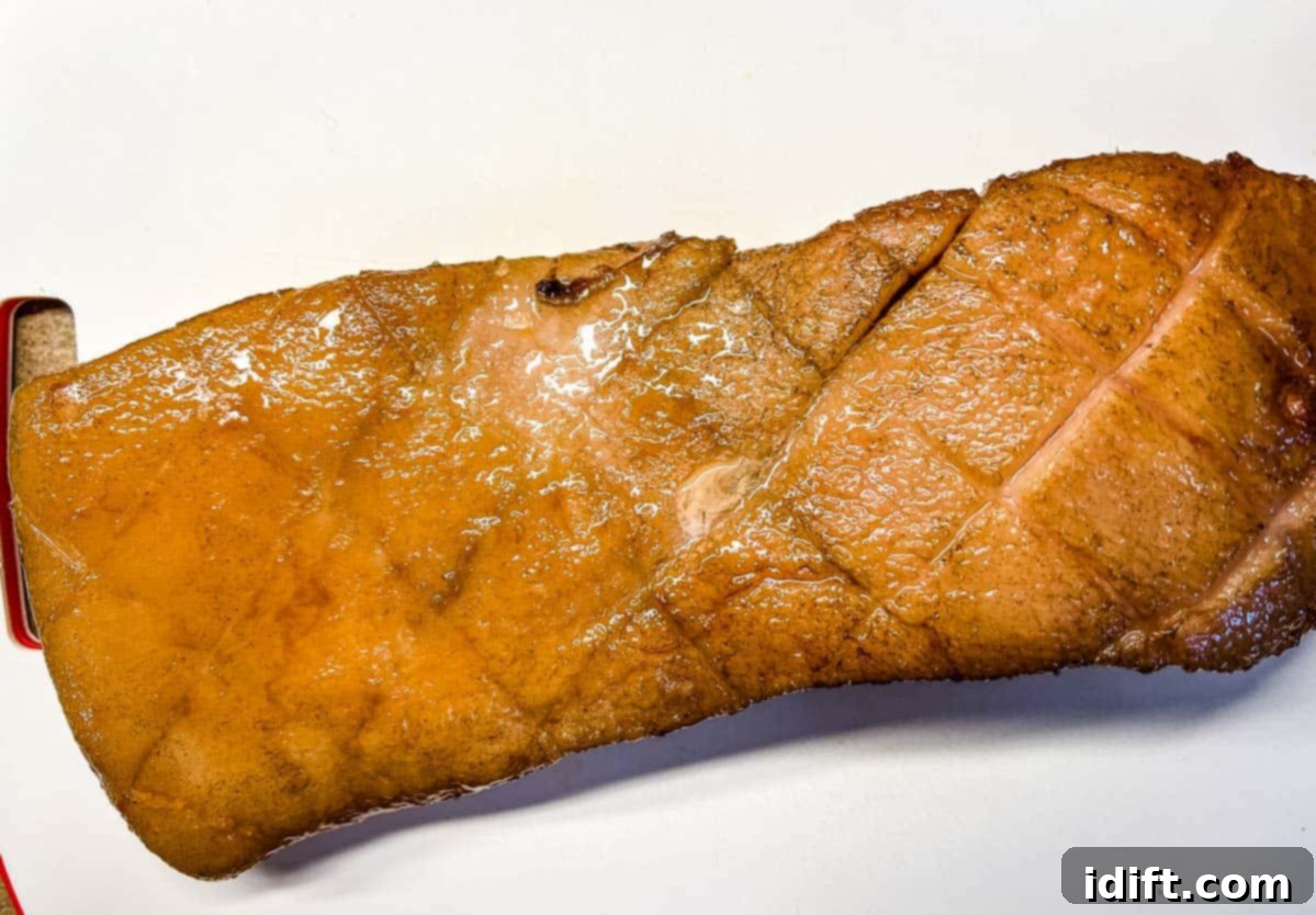 Pork belly after being smoked to a golden-brown finish.