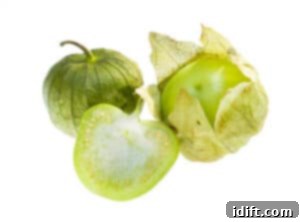 Tomatillos on a white background.