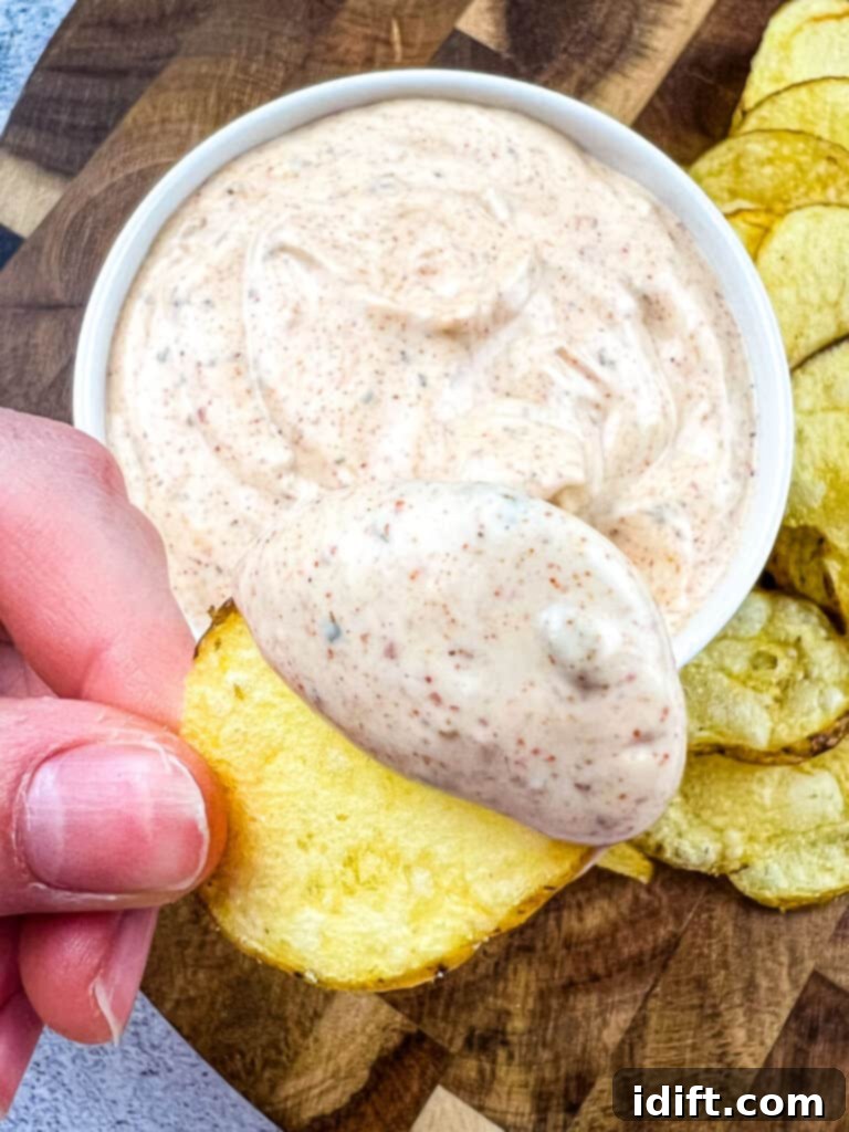 Cajun Kick Sauce 2 Cajun dip on a potato chip.