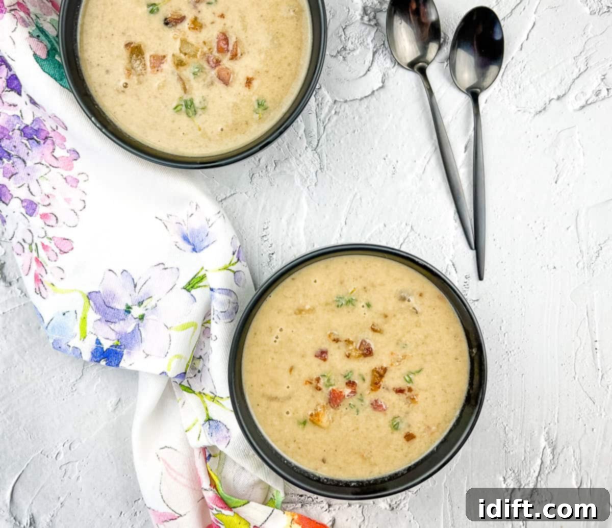 Sweet Caramelized Onion and Umami Mushroom Soup 12 Two servings of the finished Caramelized Onion and Mushroom Soup, elegantly served, enriched with cream, seasoned, and garnished with crispy bacon or pancetta.