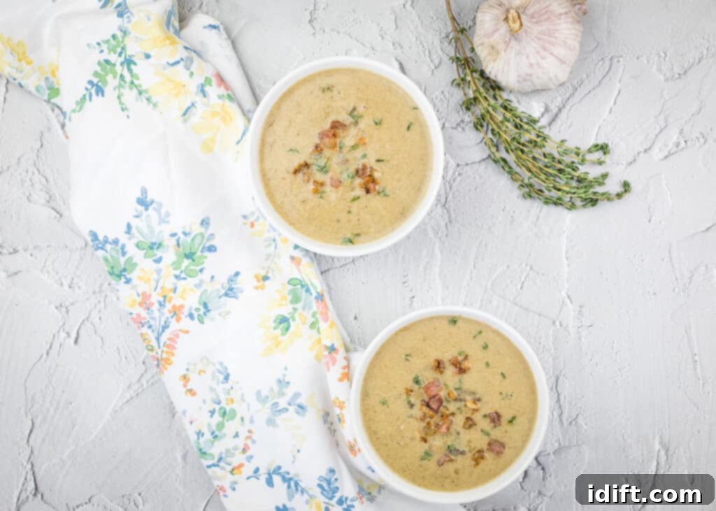 Sweet Caramelized Onion and Umami Mushroom Soup 3 A horizontal, top-down view showcasing two inviting bowls of Caramelized Onion and Mushroom Soup, garnished and ready to be enjoyed.