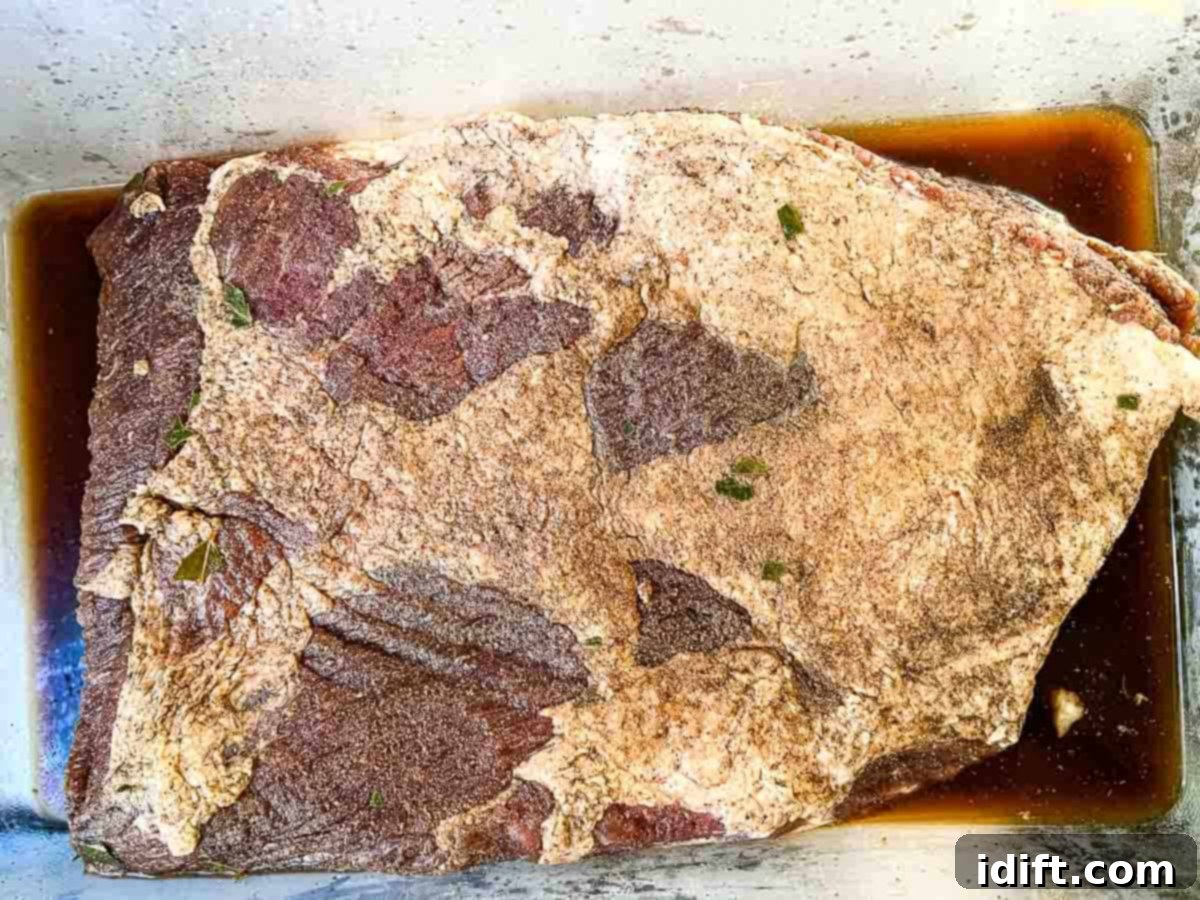 Crafting Montreal Smoked Meat at Home 10 Brisket soaking in water after 7 days of curing to remove excess salt.