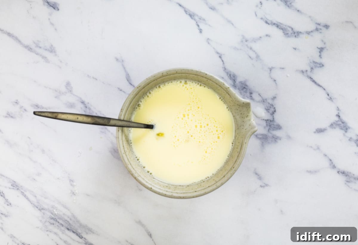 Wholesome Apple Date Walnut Muffins 9 Egg and milk mixed thoroughly in a smaller bowl.