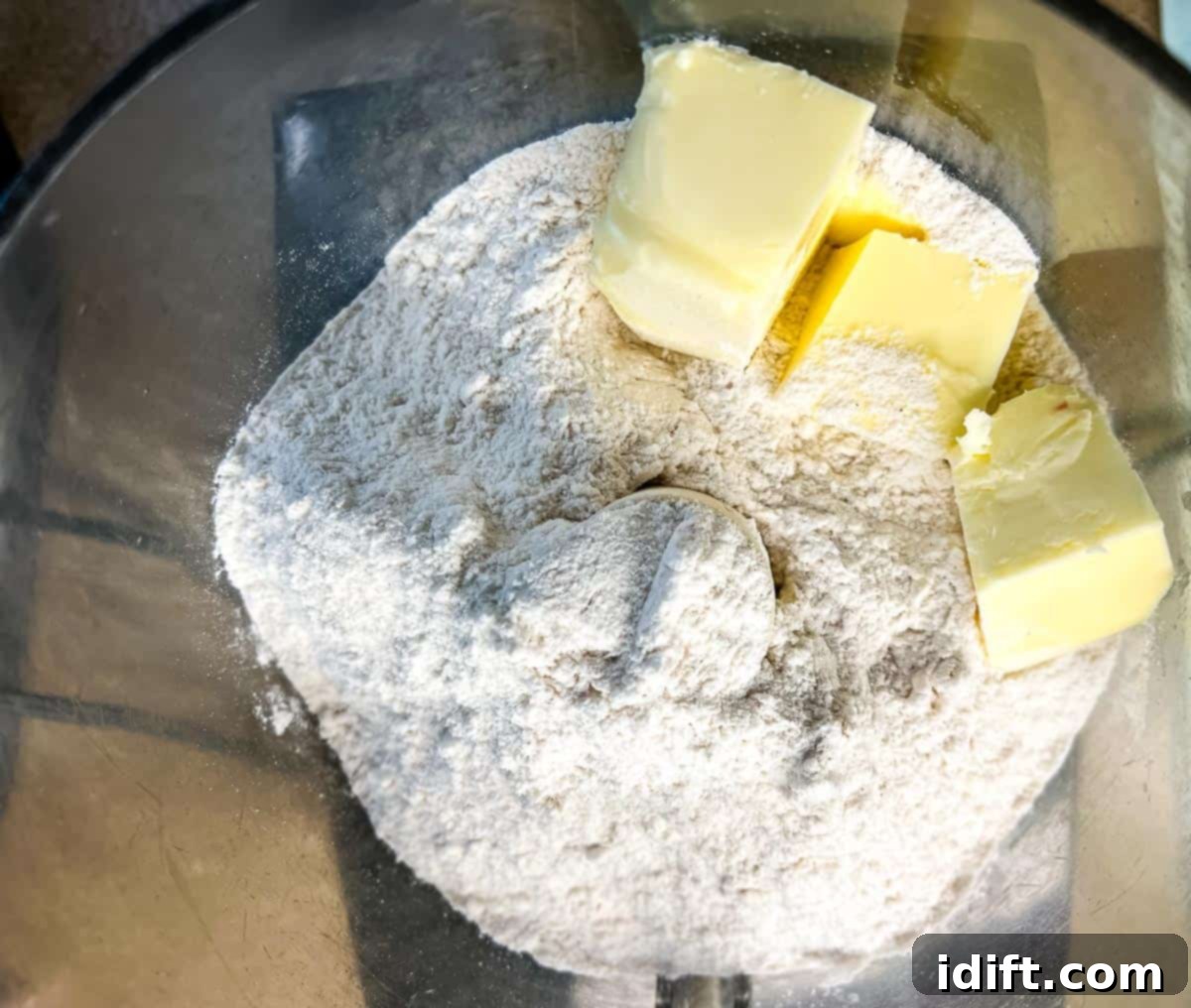 Wholesome Apple Date Walnut Muffins 6 Butter and dry ingredients in a food processor, pulsed to sandy texture.