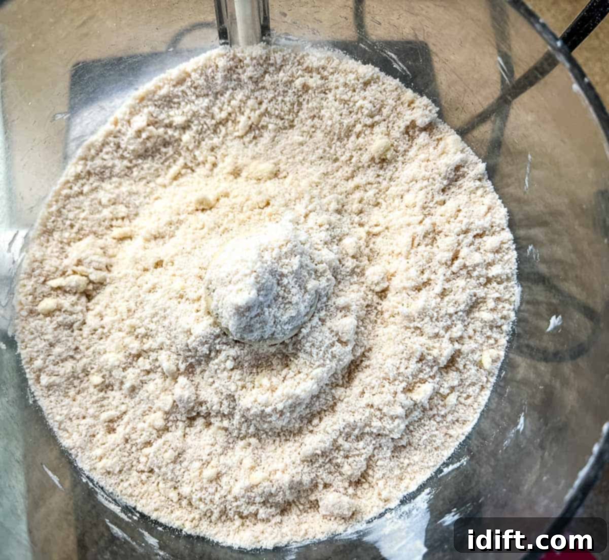 Wholesome Apple Date Walnut Muffins 7 Coarse crumbs of flour and butter after pulsing in the food processor.