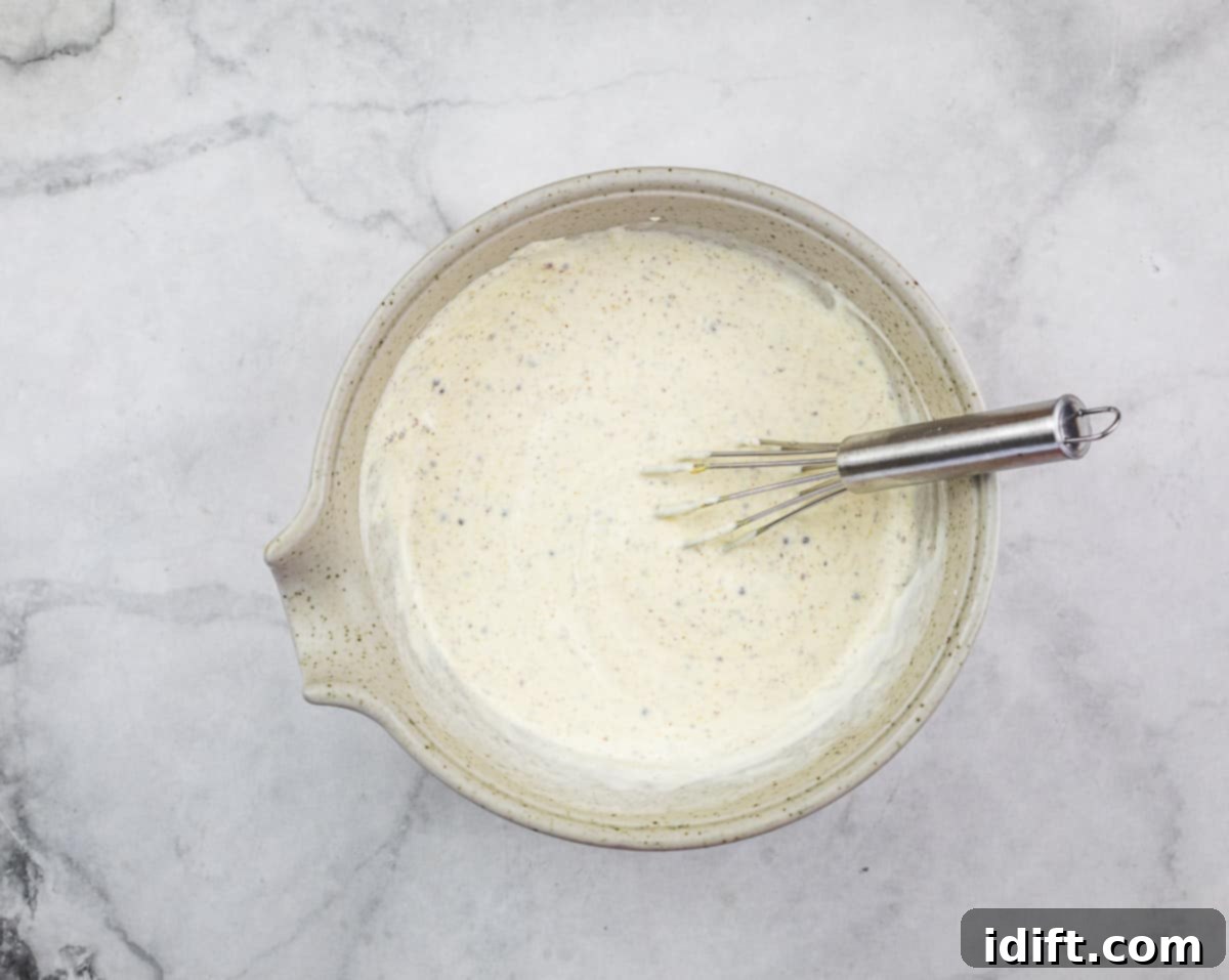 Savory Kraut Poppers 15 Mixed mustard sauce in a bowl.