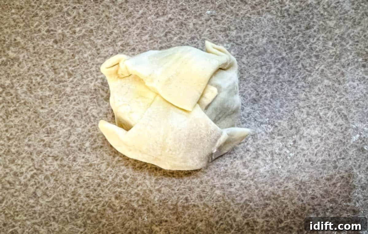 A sealed Beef Wellington Puff Pastry bite.