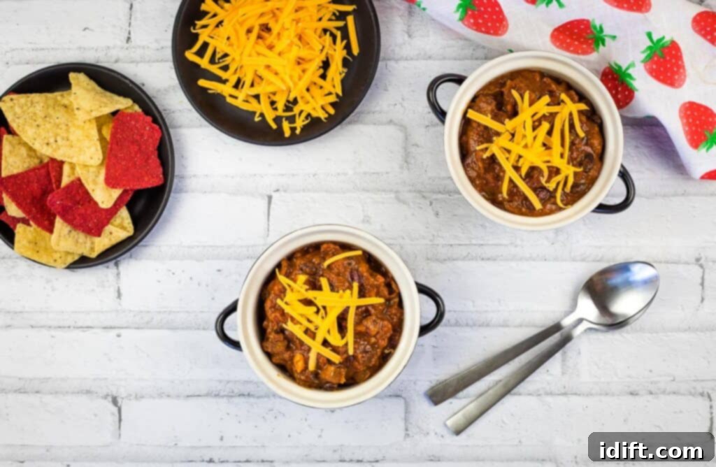 A top down shot of bowls of smoked beef chili.