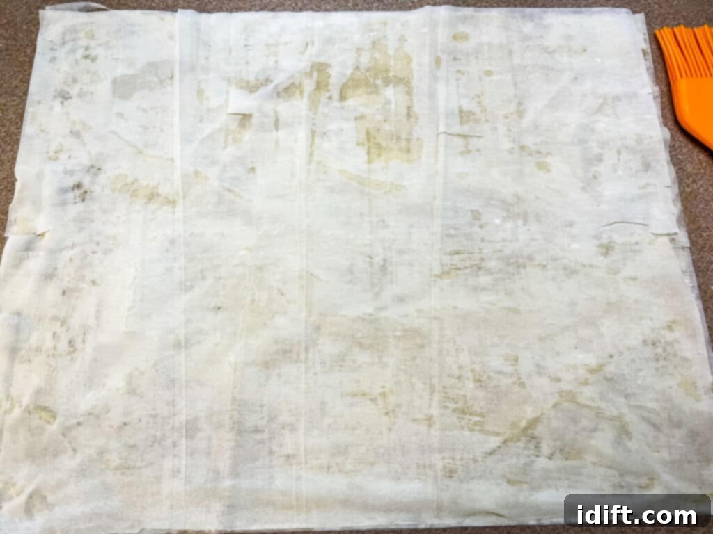 Another layer of phyllo with butter on it.