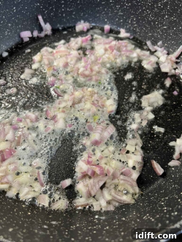 Shallots sauteeing in butter.
