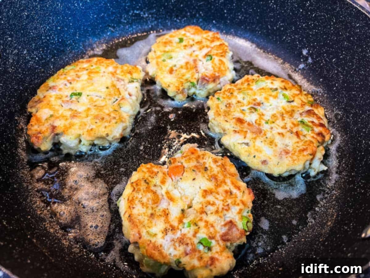 The Heart of Thanksgiving Dinner 11 Patties fried golden brown in the skillet.