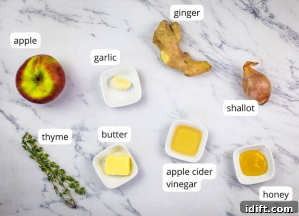 All the fresh and carefully measured ingredients for making Baked Brie with Apple Ginger Chutney, neatly arranged and labeled.