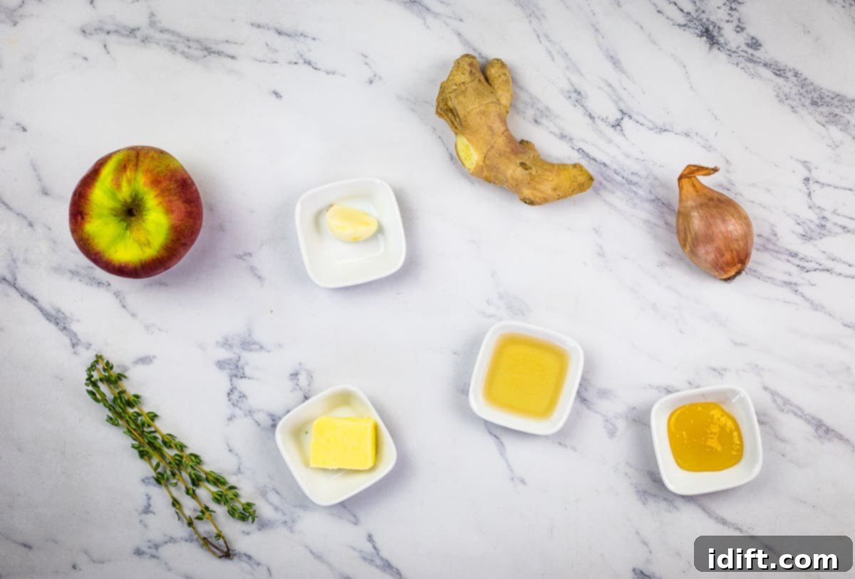 All necessary ingredients for the Apple Ginger Chutney, including diced apples, fresh ginger, shallots, and butter, neatly arranged.