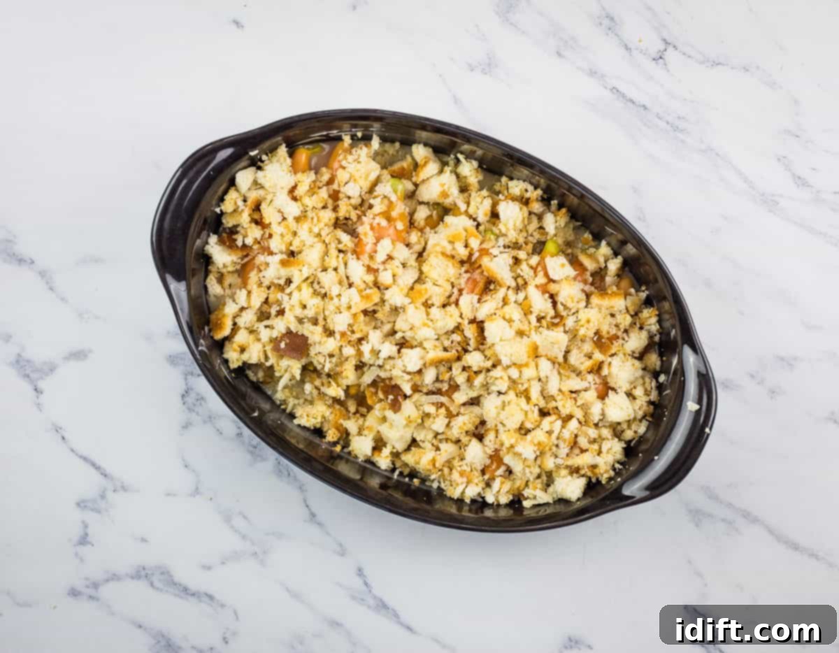 Fiery Breadcrumb Carrot Gratin 13 Carrots in the baking dish, generously covered with the spicy breadcrumb topping, ready to go into the oven.