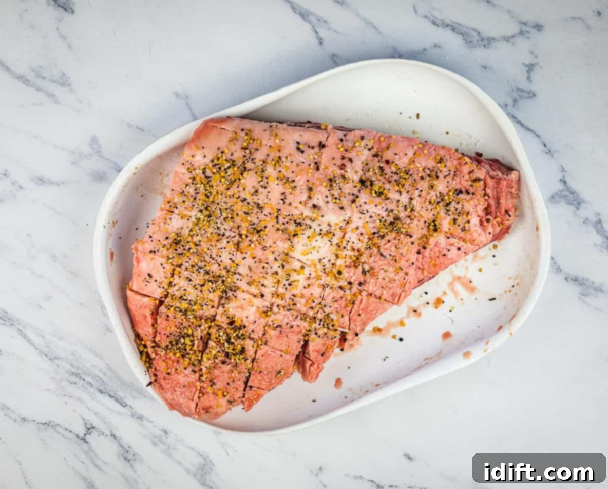 Perfectly Smoked Picanha 8 Picanha scored in a diamond pattern and seasoned generously on the fat cap.