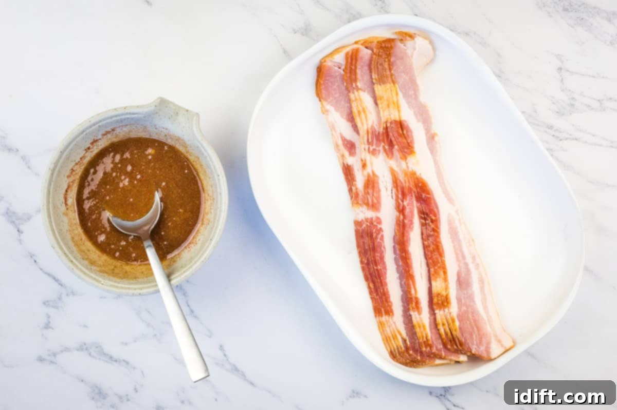 Millionaire's Bacon 7 Brown sugar, syrup and spices mixed in a bowl next to the raw bacon.