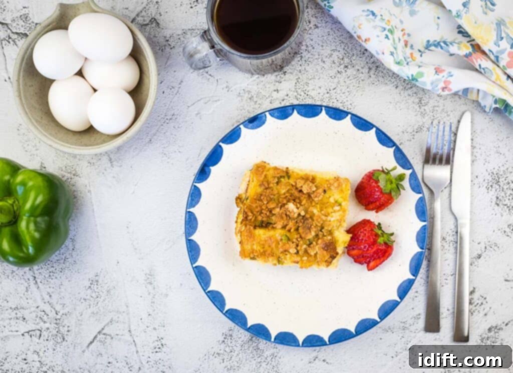 A top-down shot of a golden-brown Christmas Morning Casserole, fresh out of the oven, in a baking dish.
