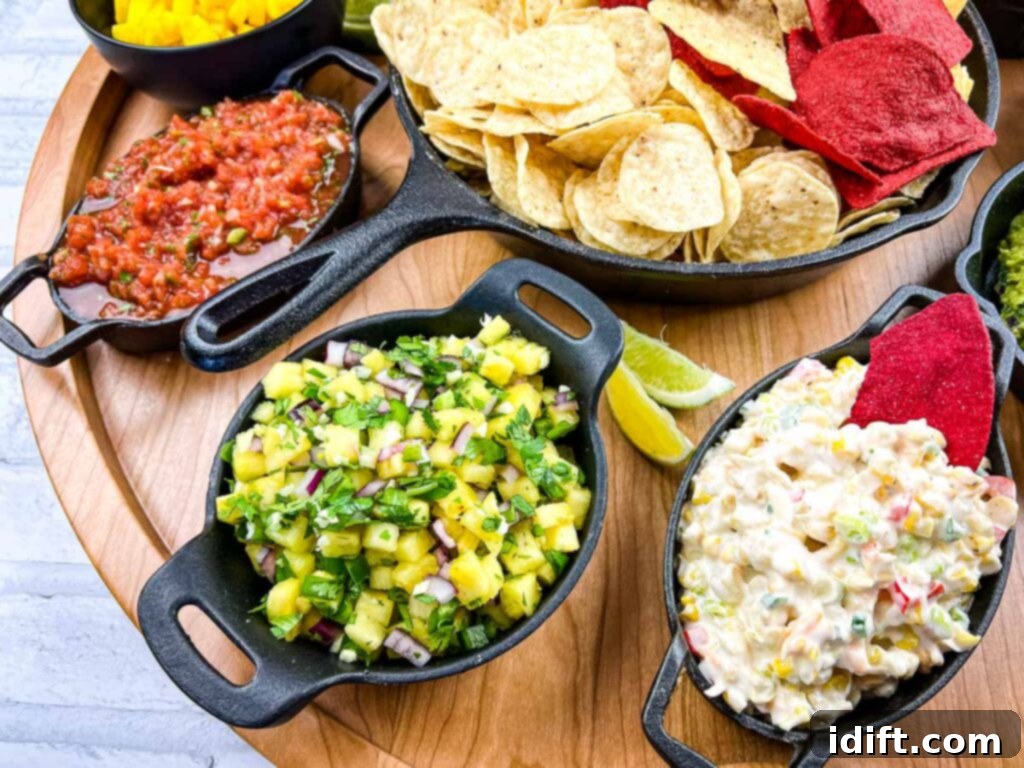 Lone Star Pineapple Salsa 3 A vibrant platter of appetizers featuring homemade pineapple salsa, cold corn dip, and food processor salsa.
