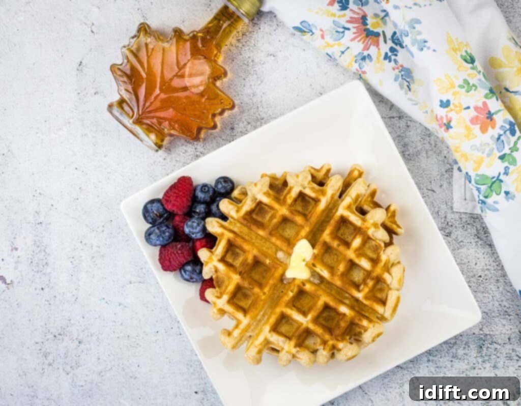 Air Fryer Frozen Waffles: The Ultimate Crisp 3 A top-down shot of frozen waffles arranged in a single layer in an air fryer basket.