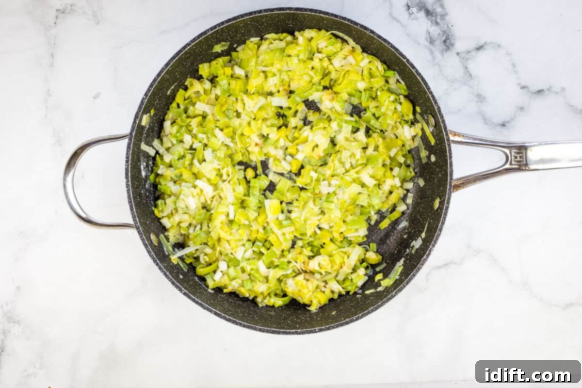 Deglazing the skillet with white wine.