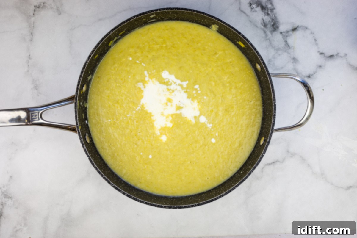 Cream added to the pureed soup.