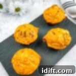 Savory Pizza Cups 12 Pizza Muffins on a black plate.