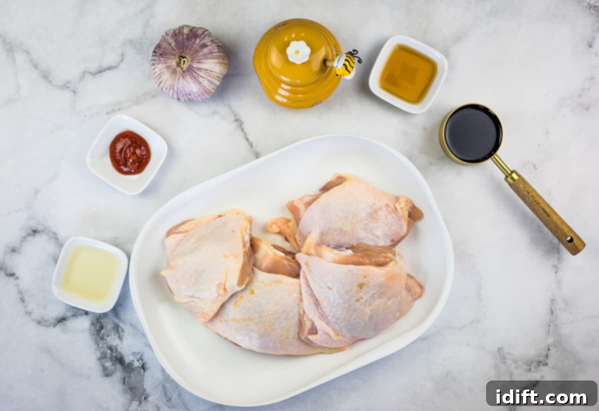 Ingredients to make air fryer honey garlic chicken thighs.