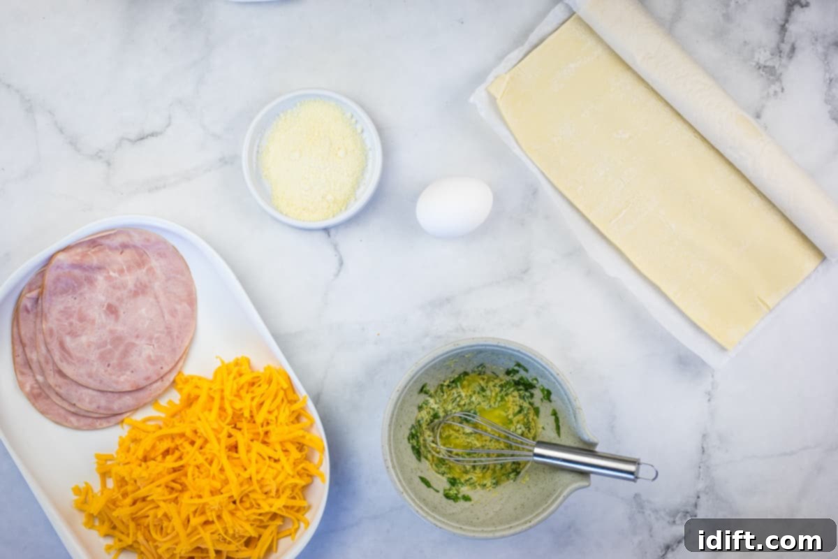 Ingredients laid out on a counter to make Ham and Cheese Turnovers.