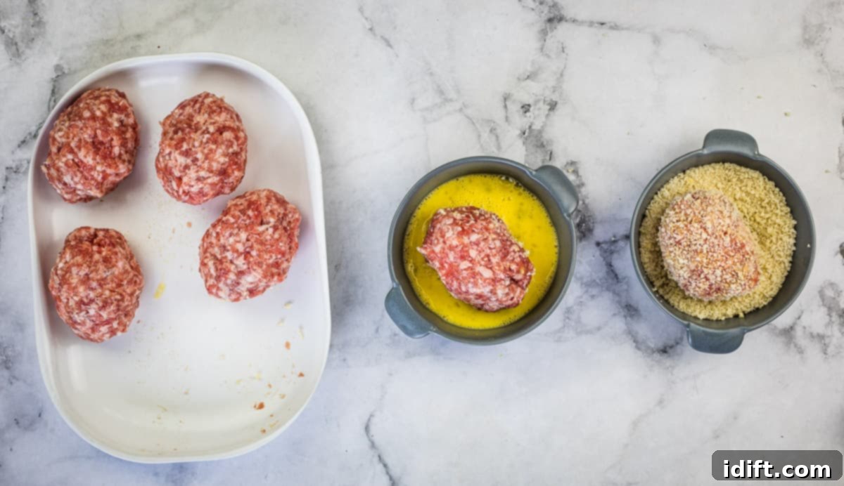 Crispy Baked Scotch Eggs 10 Sausage wrapped scotch egg dipped in egg wash.