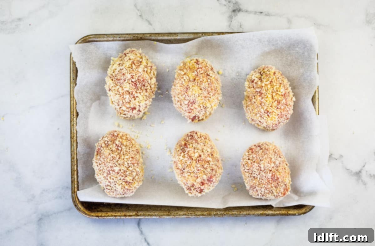 Crispy Baked Scotch Eggs 11 Breaded Scotch Eggs ready for baking.