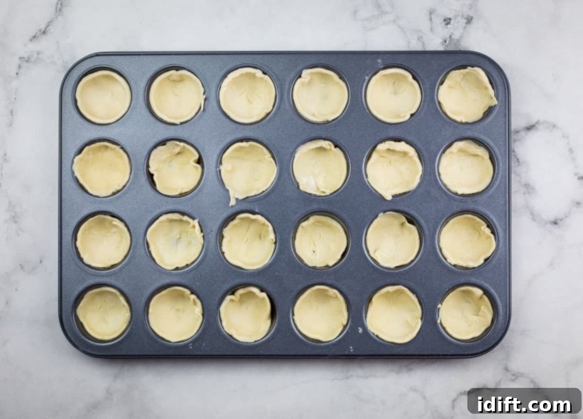 Shepherds Pie Poppers 10 Pastry circles pressed into a mini muffin tin.