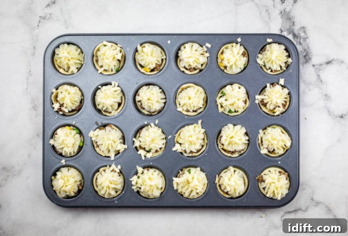 Shepherds Pie Poppers 12 Mashed potato and cheese topping added to the mini Shepherd's Pie Bites.
