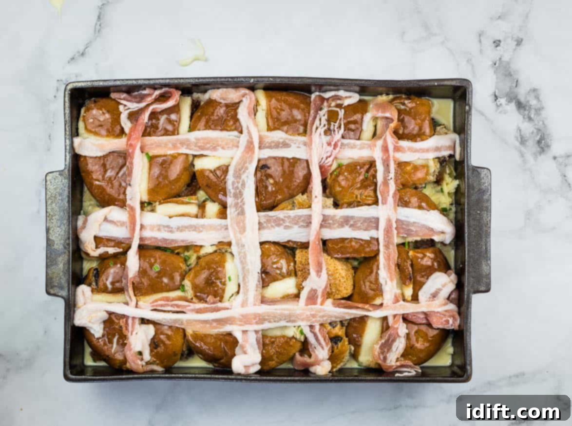 Spiced Hot Cross Bun French Toast Bake 10 Final layer on the casserole.