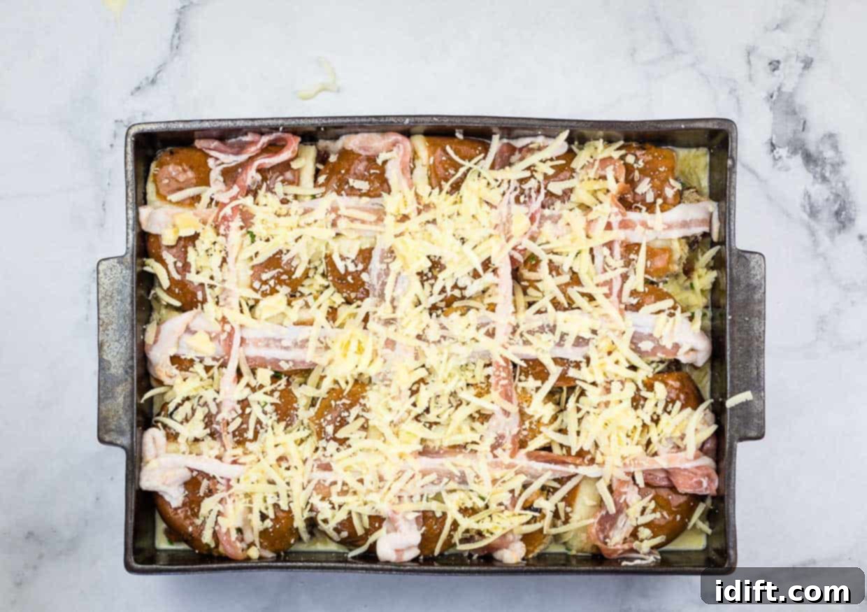 Spiced Hot Cross Bun French Toast Bake 11 Hot Cross Bun Breakfast Casserole ready for the oven.