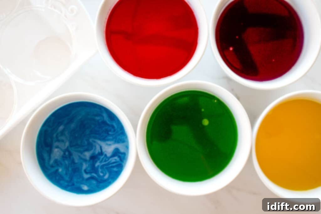 Springtime Dessert Cups 4 Cooling gelatin in various colors, ready to be added to the dessert cups.