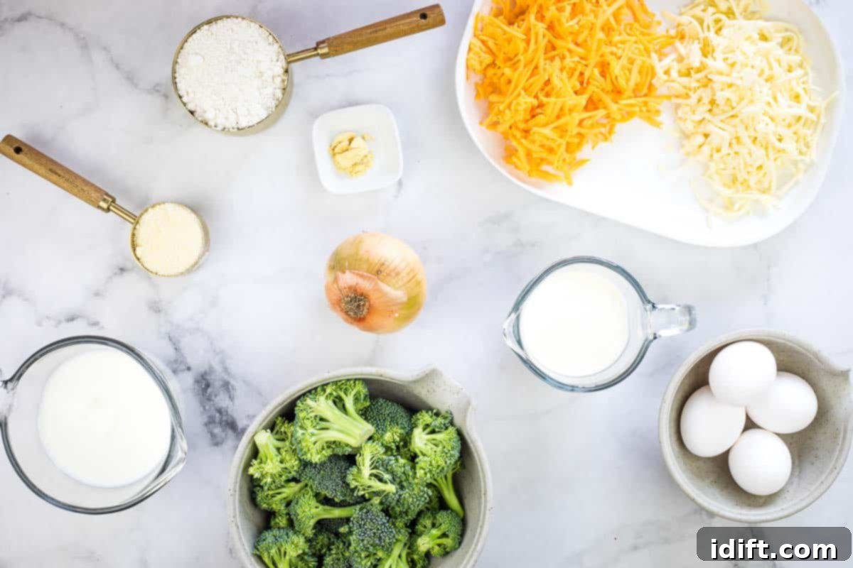 Impossible Broccoli Three-Cheese Quiche 6 A neatly arranged collection of all the fresh ingredients needed to make a delicious broccoli 3-cheese impossible quiche.