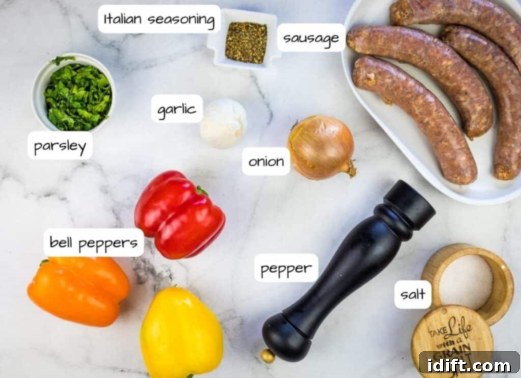 Labeled ingredients for Blackstone Sausage & Peppers laid out on a cutting board.