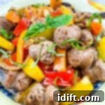 Summer Cookout Feast 16 Blackstone Sausage & Peppers in a serving bowl.