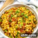 Summer Cookout Feast 19 Bacon Fried Corn in a white serving bowl.