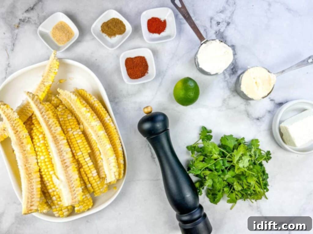 All the necessary ingredients to make Grilled Elote Corn Ribs laid out on a table.