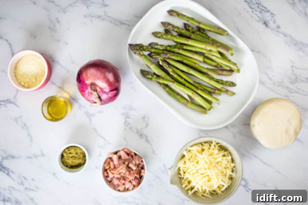 Asparagus and Prosciutto Masterpiece 6 Ingredients for Ham & Asparagus Pizza laid out.