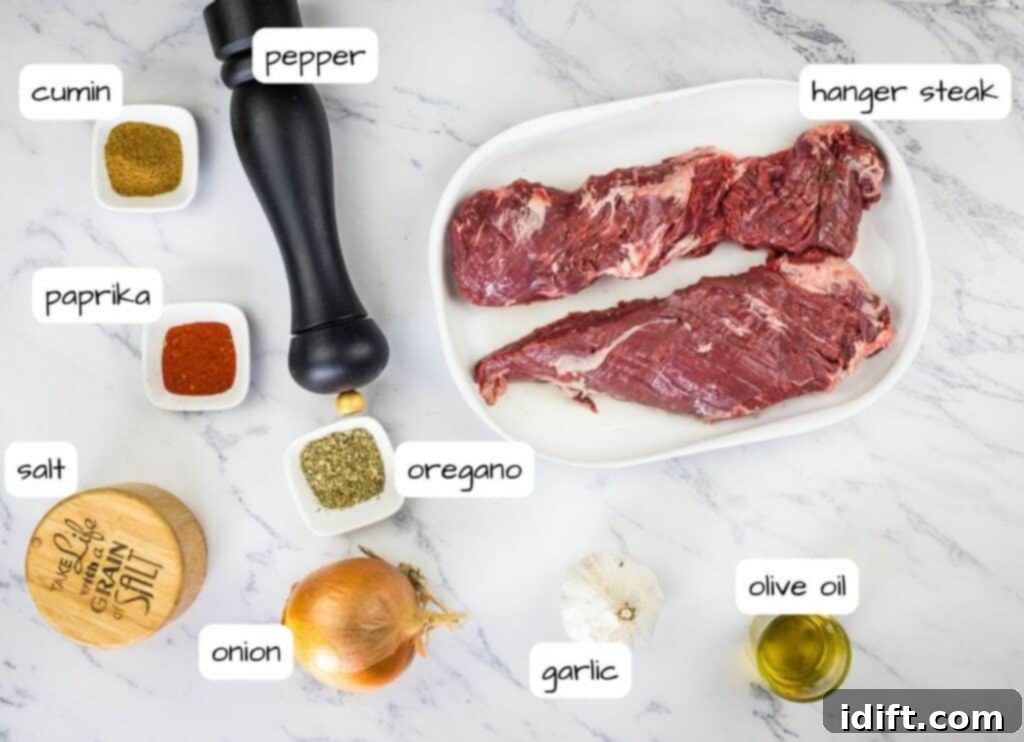 Tender Hanger Steak with Bright Chimichurri 5 Various labeled ingredients for making grilled hanger steak arranged on a counter.