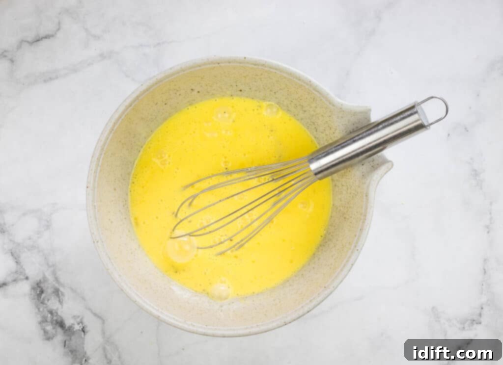 Whipped eggs in a bowl.