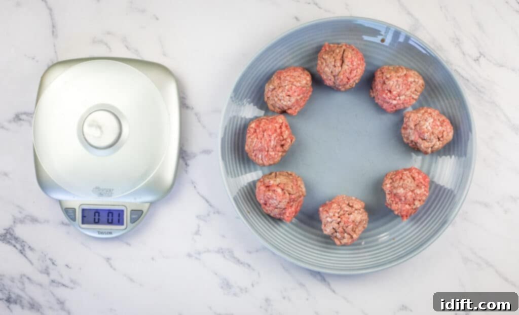 Griddle Gold: The Art of the Blackstone Smash Burger 9 Two-ounce meat balls precisely weighed out and arranged on a plate.